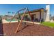 Backyard features a pool, patio, and a swing set that creates an enjoyable outdoor living and play area at 1311 W Palo Verde Dr, Chandler, AZ 85224