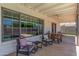 Cozy covered patio with comfortable seating, perfect for enjoying the outdoors and relaxation at 1311 W Palo Verde Dr, Chandler, AZ 85224