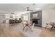 Bright living room features a fireplace, dining area, and views of the modern kitchen at 1311 W Palo Verde Dr, Chandler, AZ 85224