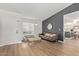 Cozy living room featuring wood floors, modern lighting, and stylish decor at 1311 W Palo Verde Dr, Chandler, AZ 85224