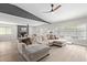 Spacious living room with wood floors, comfortable sectional, and an open layout at 1311 W Palo Verde Dr, Chandler, AZ 85224