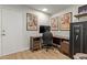Office area has built-in desk and shelving with two colorful vintage posters at 1311 W Palo Verde Dr, Chandler, AZ 85224
