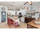 Bright and modern kitchen featuring white cabinets, granite countertops, and stainless steel appliances at 13146 S 178Th Ave, Goodyear, AZ 85338