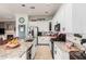 Spacious kitchen with stainless steel appliances, granite countertops, and white cabinets at 13146 S 178Th Ave, Goodyear, AZ 85338