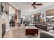 Spacious open-concept living area with a kitchen view and comfortable seating arrangement at 13146 S 178Th Ave, Goodyear, AZ 85338