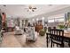 Spacious living room showcasing eclectic decor, comfortable seating, and bright, airy atmosphere at 13146 S 178Th Ave, Goodyear, AZ 85338
