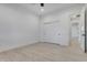 Spacious bedroom featuring wood-look floors, neutral paint and a closet at 1602 E Cloud Rd, Phoenix, AZ 85086