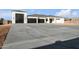 Beautiful exterior featuring a concrete driveway and 3-car garage at 1602 E Cloud Rd, Phoenix, AZ 85086