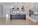 Kitchen features stainless appliances, subway tile backsplash, granite counters and center island at 1602 E Cloud Rd, Phoenix, AZ 85086
