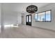 Bright, open living area with wood floors and a view of the outdoors at 1602 E Cloud Rd, Phoenix, AZ 85086