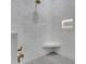 Tiled walk-in shower with seating, a rainfall shower head, and a built-in niche at 1602 E Cloud Rd, Phoenix, AZ 85086