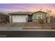 Beautiful single-story home with a tandem 3-car garage on a tree-lined street at 17286 W Running Deer Trl, Surprise, AZ 85387