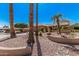 Attractive single-story home with desert landscaping, tile roof, and ample parking at 18014 N Calypso Ct, Surprise, AZ 85374