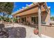 Relaxing patio with comfortable seating, serene garden views, and shaded retreat at 18014 N Calypso Ct, Surprise, AZ 85374