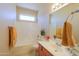 Bright bathroom with a tub-shower combination and decorative accents at 1825 E Sycamore Rd, Casa Grande, AZ 85122