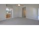 Large primary bedroom featuring soft carpet and an ensuite bathroom at 1825 E Sycamore Rd, Casa Grande, AZ 85122