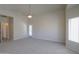 Spacious bedroom with bright windows and access to a private balcony at 1825 E Sycamore Rd, Casa Grande, AZ 85122