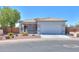 Charming single-story home featuring a well-maintained desert landscaped yard and a spacious two-car garage at 1825 E Sycamore Rd, Casa Grande, AZ 85122