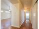 Inviting hallway featuring wood floors and access to the living room at 1825 E Sycamore Rd, Casa Grande, AZ 85122