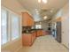 Bright kitchen features modern appliances and seamless transition to an inviting living space at 1825 E Sycamore Rd, Casa Grande, AZ 85122