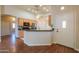 Well-lit kitchen featuring granite countertops and an open design for easy entertaining at 1825 E Sycamore Rd, Casa Grande, AZ 85122