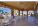 Large outdoor patio offering ample seating, ceiling fans, and views of the community at 1825 E Sycamore Rd, Casa Grande, AZ 85122