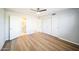 Bright bedroom with modern floors, closet space, and an en-suite bathroom featuring updated fixtures at 20602 N 31St Dr, Phoenix, AZ 85027