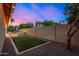 Beautiful backyard boasts a lush lawn, mature landscaping, and serene privacy for outdoor enjoyment and relaxation at 21 W Pecan Pl, Tempe, AZ 85284