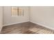 Cozy bedroom with hardwood floors and a window at 21 W Pecan Pl, Tempe, AZ 85284