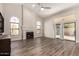 Expansive living room with high ceilings, a fireplace, and large windows offering ample natural light at 21 W Pecan Pl, Tempe, AZ 85284