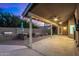 Covered patio featuring a built-in grill, seating, and ceiling fans at 21 W Pecan Pl, Tempe, AZ 85284