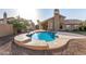 Inviting backyard pool with privacy landscaping, outdoor kitchen, and extended patio perfect for entertaining at 21 W Pecan Pl, Tempe, AZ 85284