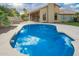Expansive pool with tile trim and outdoor kitchen area, a perfect backyard retreat for entertaining friends and Gathering at 21 W Pecan Pl, Tempe, AZ 85284