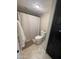 Compact bathroom with a shower and toilet, offering essential functionality at 2634 E Fountain St, Mesa, AZ 85213