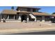 Charming home featuring a covered entry, manicured gravel yard, and attached two-car garage at 2634 E Fountain St, Mesa, AZ 85213