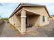 Backyard features a covered patio and desert landscaping at 2753 S 85Th Way, Mesa, AZ 85209