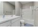 Cozy bathroom with a shower-tub combination and a white single sink vanity at 2753 S 85Th Way, Mesa, AZ 85209
