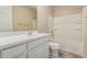 Bright bathroom with neutral walls and white cabinets, sink, toilet and bath at 2753 S 85Th Way, Mesa, AZ 85209