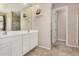Neutral bathroom features double sinks, large mirror, tile floors and a separate toilet and shower room at 2753 S 85Th Way, Mesa, AZ 85209