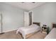 Bedroom with gray walls, ceiling fan, carpet floors, window and closet at 2753 S 85Th Way, Mesa, AZ 85209