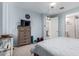 Bright bedroom features a ceiling fan, tv and neutral carpet at 2753 S 85Th Way, Mesa, AZ 85209