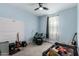 Musical bedroom featuring musical instruments, ceiling fan and a calming color scheme at 2753 S 85Th Way, Mesa, AZ 85209