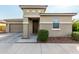Charming single-Gathering home featuring a two-car garage and inviting front porch at 2753 S 85Th Way, Mesa, AZ 85209