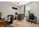 Home office with carpet floors, neutral walls and a large window at 2753 S 85Th Way, Mesa, AZ 85209