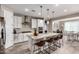 Open kitchen with a granite island, stainless appliances, and ample counter space at 2753 S 85Th Way, Mesa, AZ 85209