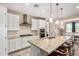 Bright kitchen featuring granite countertops, stainless steel appliances and eat-in breakfast bar at 2753 S 85Th Way, Mesa, AZ 85209