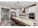 Bright, updated kitchen featuring granite counters, stainless appliances, and island seating at 2753 S 85Th Way, Mesa, AZ 85209