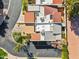 High angle aerial view of property featuring desert landscaping, gray shingles and terracotta tile roofs at 2910 E Avenida Olivos --, Phoenix, AZ 85016