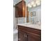 Bathroom featuring granite countertops, updated fixtures and hardware and wooden cabinets at 2910 E Avenida Olivos --, Phoenix, AZ 85016