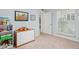 Bright bedroom with a dresser, carpet floors and plenty of natural light at 2910 E Avenida Olivos --, Phoenix, AZ 85016